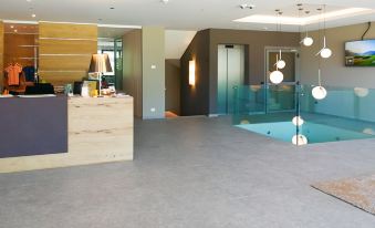 The Lodge Sporthotel - Golfclub Eppan - Housity