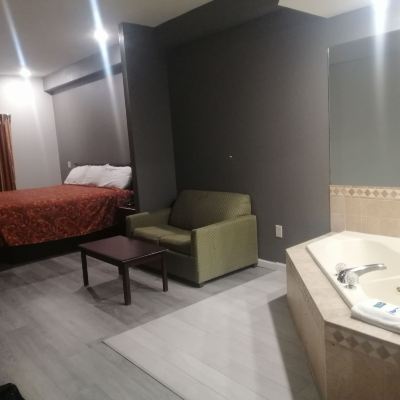 Standard Suite, 1 King Bed, Smoking, Jetted Tub Royal Inn & Suite Promo Code