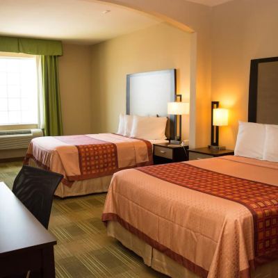 2 Queen Beds Room, Non-Smoking Coratel Inn & Suites by Jasper Cotulla Promo Code