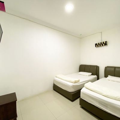 Kembar Mewah Kupon OYO 90087 Warisan Motel