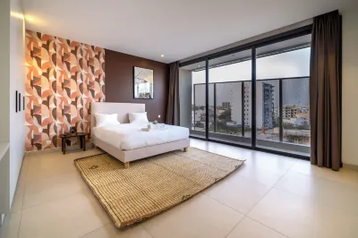 AfricaWorks Suites Hôtels à : 