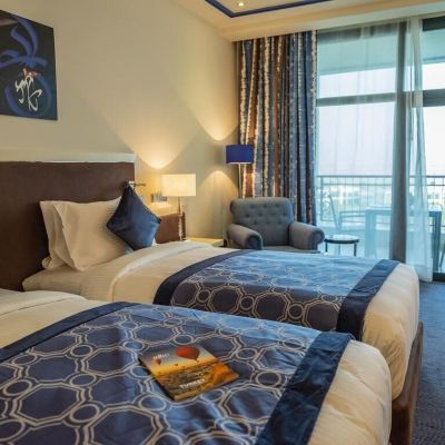 Twin Room With Balcony And Pool View Retaj Salwa Resort & Spa Promo Code
