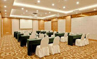 The ballroom is arranged with tables and chairs for a large event at Holiday Inn Shanghai Pudong