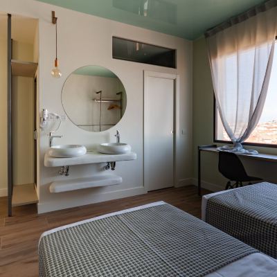 Triple Room with City View Hostal Charlotte Promo Code