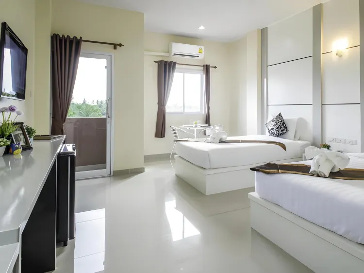 ห้องมาตรฐานเตียงแฝดพร้อมเครื่องปรับอากาศ