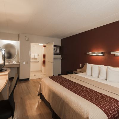 ADA Accessible Superior King Room with Roll In Shower Smoking Red Roof Inn Houston - Westchase Promo Code