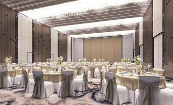 a formal dining room with round tables covered in white tablecloths and chairs arranged for a wedding or special event at Divalux Resort and Spa Bangkok, Suvarnabhumi Airport-Free Shuttle