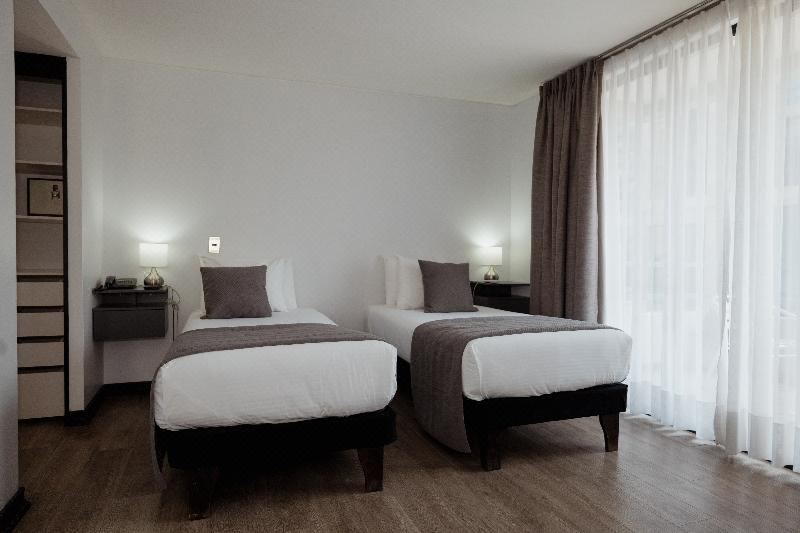 Twin Estandar Twin (2 Camas Individuales)