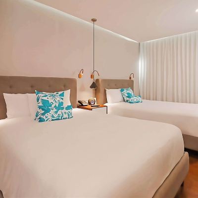 2 Double Beds Deluxe Courtyard View The Fives Downtown Hotel & Residences, Curio Collection by Hilton Promo Code