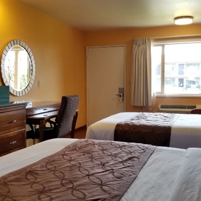 Deluxe Room, 2 Queen Beds, Refrigerator & Microwave Forks Motel Promo Code