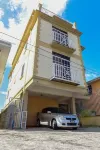 Timbo's Apartelle Hotéis em 