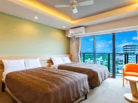 Yenns Marina Inn Mercy Hotele w: Ginowan