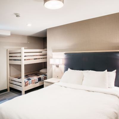 Queen Family Suite with Fireplace (Not Pet Friendly) Mountaineer Lodge Promo Code