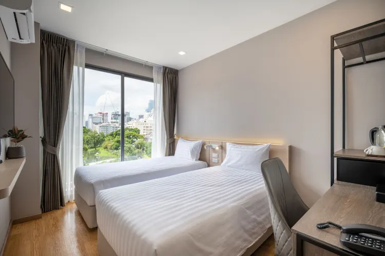 ห้องมาตรฐานเตียงแฝดพร้อมวิวสวนหย่อม