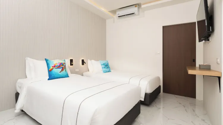 ห้องดีลักซ์เตียงแฝดพร้อมโซฟา