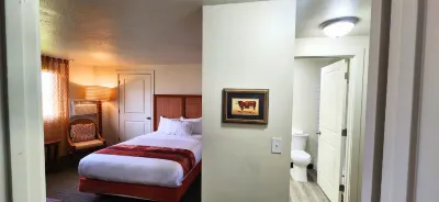 New Western Inn & Suites Отели в г. 