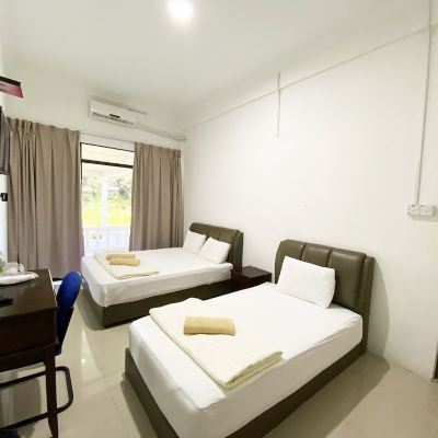 Suite Superior Kupon OYO 90087 Warisan Motel