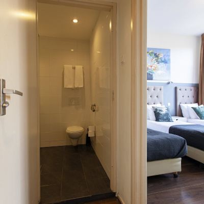 標準三人房，3張單人床，獨立浴室（部分房間位於地下室） 昆汀抵達酒店優惠