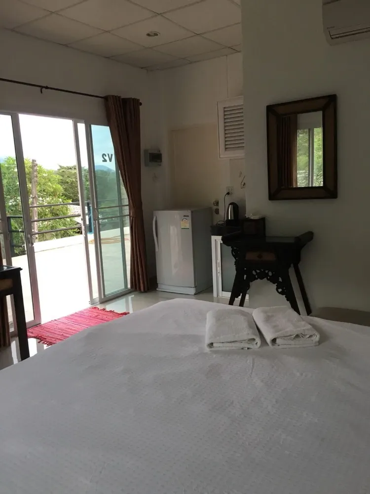 ห้องพักมาตรฐานเตียงใหญ่พร้อมเตียงใหญ่