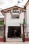 Hotel Los Laureles Отели в г. 