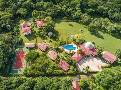 Guacamaya Lodge Отели в г. 