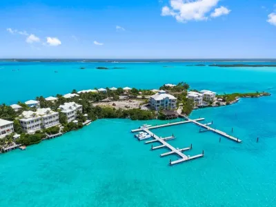 Waterfront Villa with Dock, Walk to Beach Club & Rusty Anchor Rest. 3b/r  3.5b/a Hotels in 
