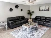 Beautiful Home in quiet neighborhood with a pool and close to stores & highways.