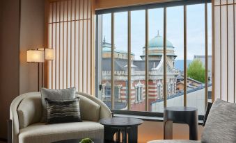 revised to provide ample natural light and a scenic view, while also featuring a spacious living area at Dusit Thani Kyoto