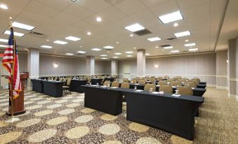 a large conference room with rows of chairs and tables set up for a meeting at Hilton Garden Inn Philadelphia/Ft. Washington