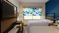 Tru by Hilton Distrito Palmerola Hotel a 