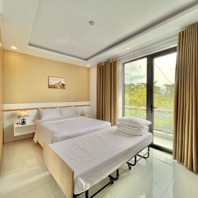 Deluxe Triple Room with Balcony Maya Hotel Promo Code