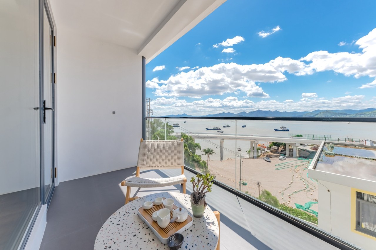 Floral Hotel·Xiapu Mid Mountain Lansu Hotel (Sansha Dongbi Store)极光-侧海景露台大床房（休闲品茶+电视+乾湿分离）