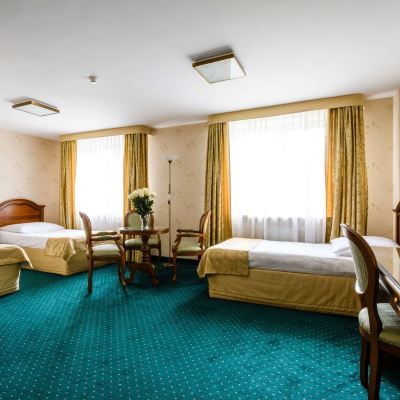 Standard Triple Room Hotel Boss Promo Code