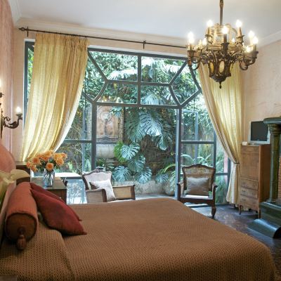 The Rainforest Suite Carved Mural Shower, Private Garden & Moroccan Fireplace Meson Panza Verde Promo Code