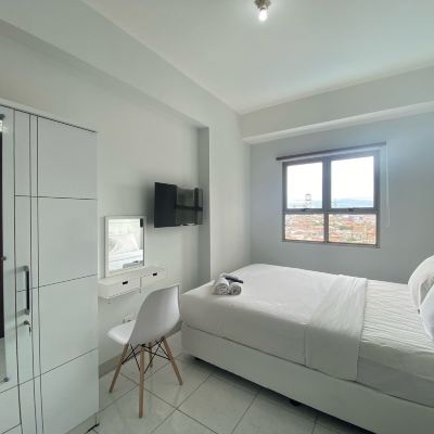 Guest Room Bright and Relaxing 2Br at Mekarwangi Square Bandung Promo Code