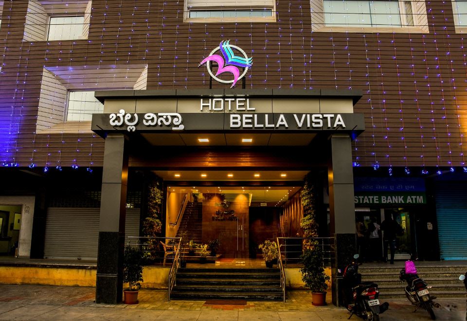 the entrance of a hotel called bella vista with stairs leading up to the building at Hotel Bella Vista