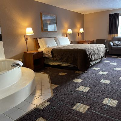 1 King Bed, Jacuzzi Suite, No Pets, Non-Smoking Walker Hotel Promo Code