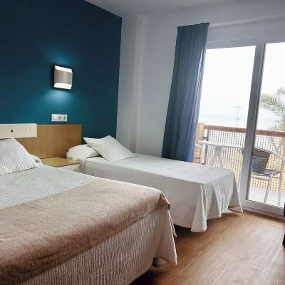 Triple Room With Sea View La Cabaña Promo Code