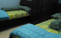 Comfy Room at Honey Guesthouse Syariah โรงแรมใน