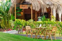 Whispering Palms Beach Resort Hotel a 