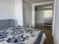 Lujoso apartamento de 2 dormitorios en Arenals del Sol con piscina y vistas al mar