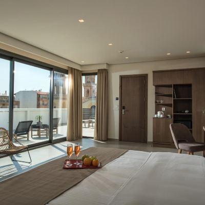 Junior Suite with Outdoor Jetted Tub and Side Sea View