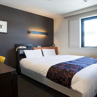 標準クイーンサイズベッドベッドルーム 喫煙 かごしまプラザホテル天文館 クーポン