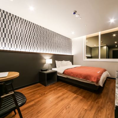 디럭스 a (라지 킹 침대) 더케이호텔 쿠폰