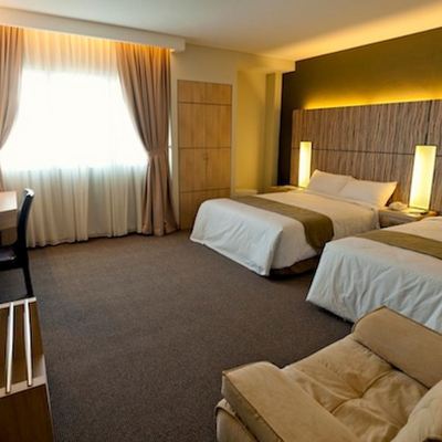 Deluxe Room Kupon Grand Medallion Hotel