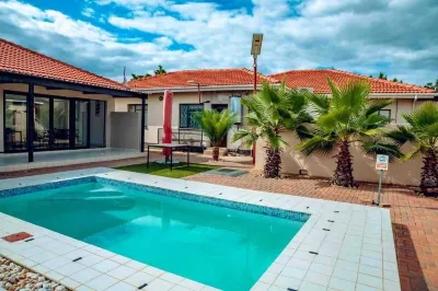 Cycad Palm Guest House Отели в г. 