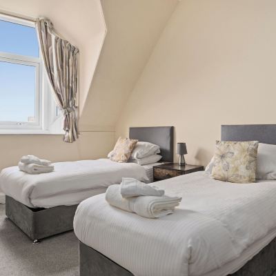 Bunk Room for 4- (Private 4 Bed Bunk Room-Shared Bathroom) Corran House Guest House & Hostel Promo Code