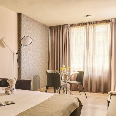 One-Bedroom Apartment with Balcony (1 Adult + 2 Children) Marbella Inn Promo Code