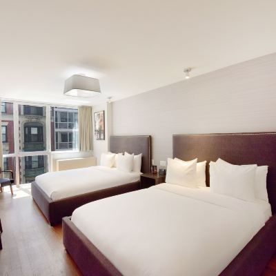 Double Queen Deluxe Hotel 32 32 Promo Code