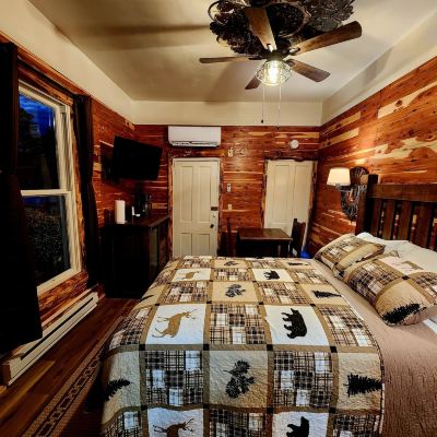 Deluxe Queen Room-Non-Smoking Log Cabin Inn Promo Code